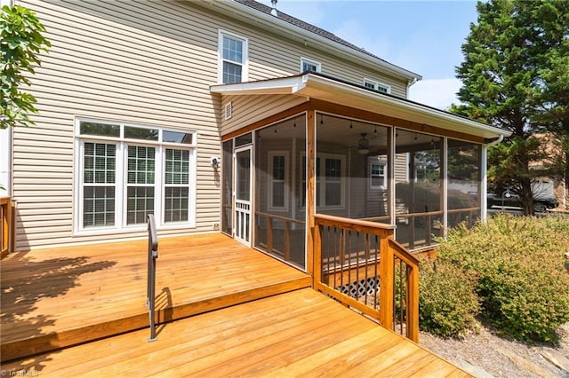 deck with a sunroom