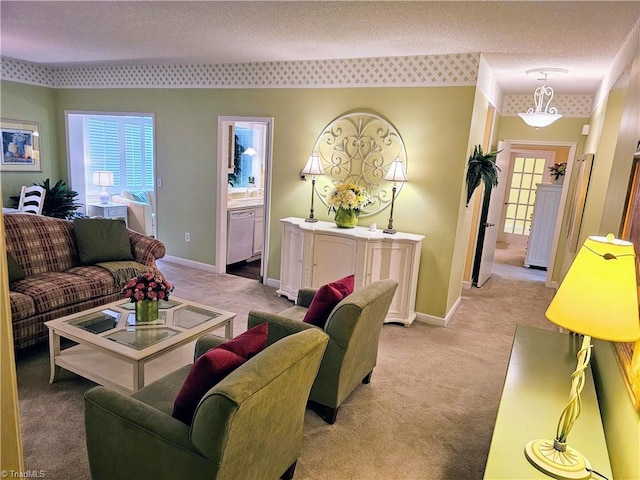 carpeted living room featuring a textured ceiling