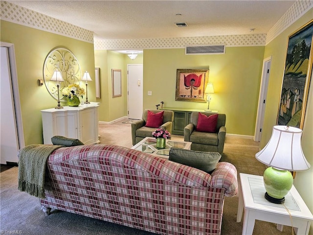 living room featuring a textured ceiling and light carpet