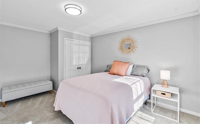 carpeted bedroom featuring ornamental molding and a closet