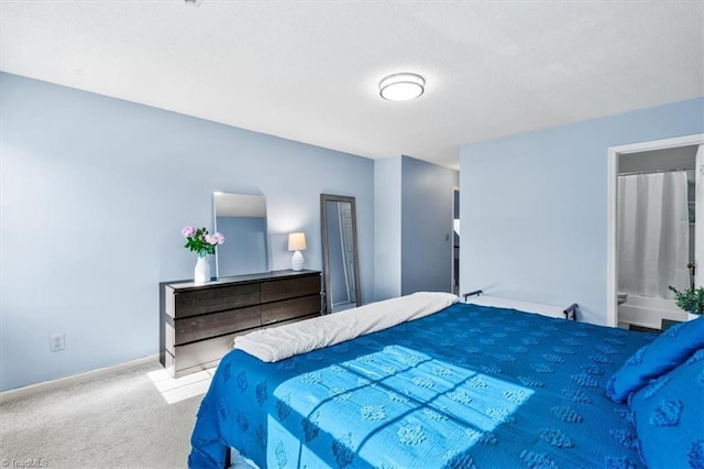 bedroom featuring light colored carpet