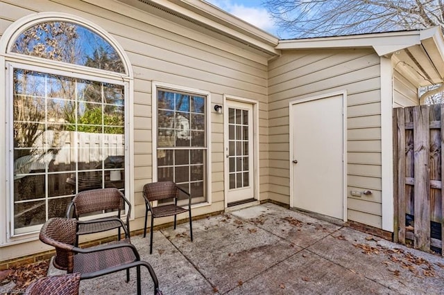 property entrance with a patio area