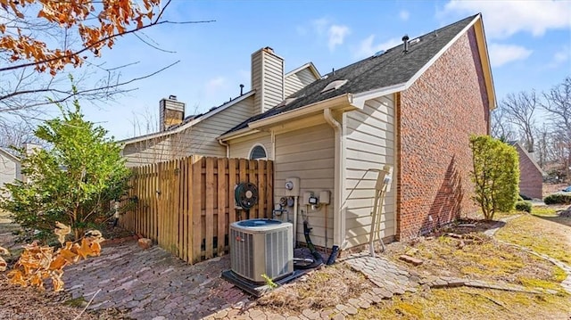 view of property exterior with cooling unit