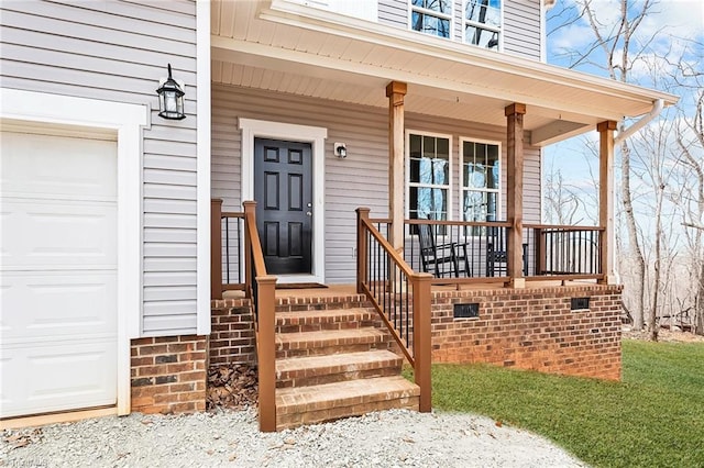 property entrance featuring covered porch