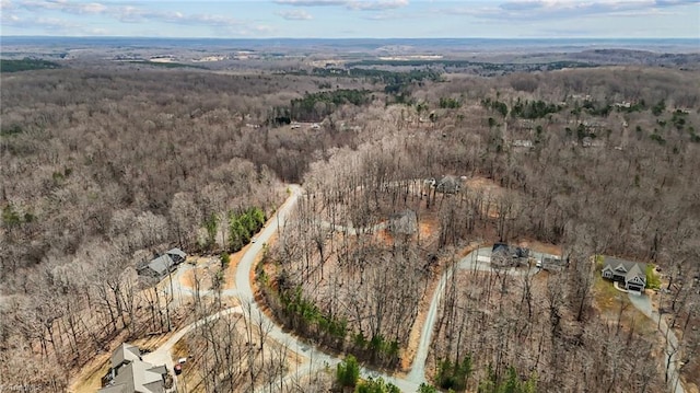 bird's eye view featuring a view of trees