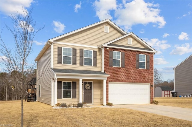 view of front of home featuring a garage and a front yard