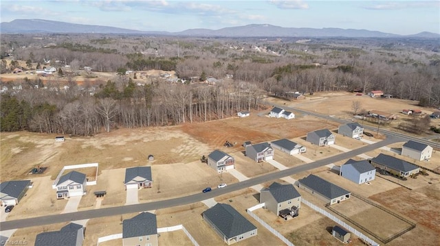 drone / aerial view featuring a mountain view