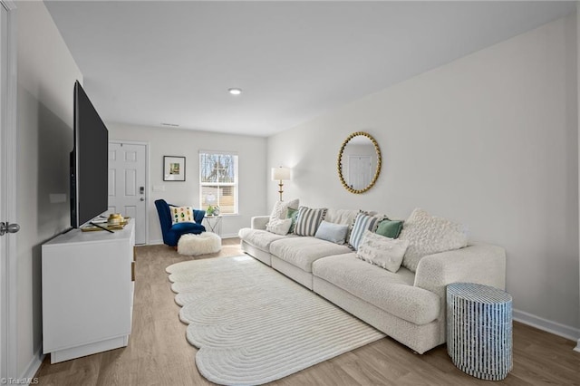 living room with hardwood / wood-style flooring