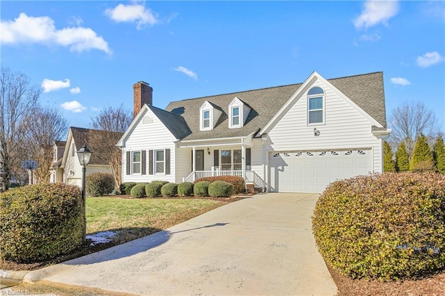 cape cod-style house with a front lawn and covered porch