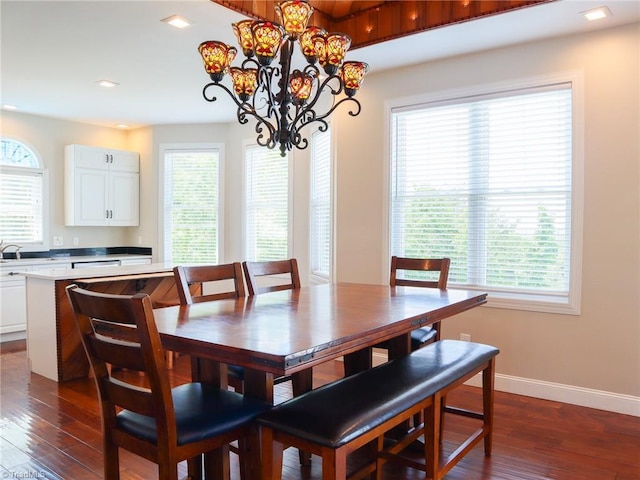 7768 Pinecone Ln, Hickory, NC 28602 - dining area with dark wood-style flooring, plenty of natural light, a chandelier, baseboards, and recessed lighting