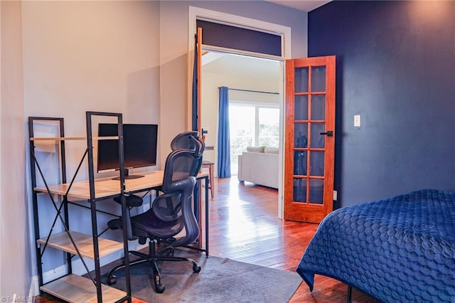7768 Pinecone Ln, Hickory, NC 28602 - bedroom featuring wood finished floors and a desk