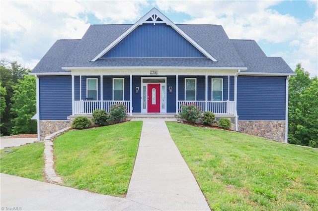 7768 Pinecone Ln, Hickory, NC 28602 - view of front facade featuring a porch, a front yard, and a shingled roof
