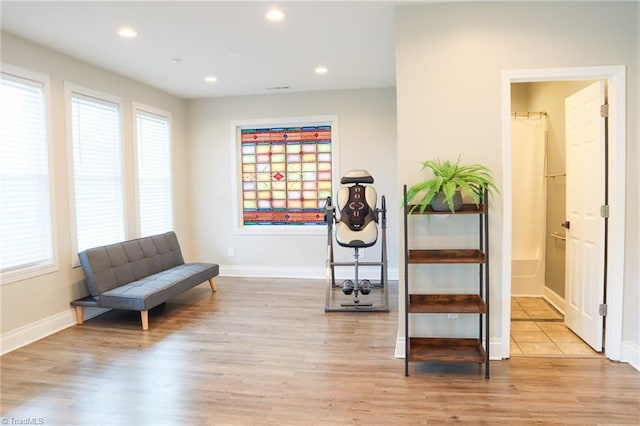 7768 Pinecone Ln, Hickory, NC 28602 - living area featuring light wood finished floors, baseboards, recessed lighting, and healthy amount of natural light
