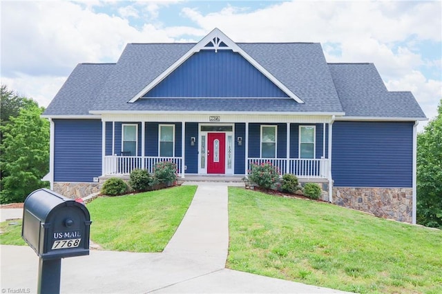 7768 Pinecone Ln, Hickory, NC 28602 - view of front of home with roof with shingles, covered porch, and stone siding