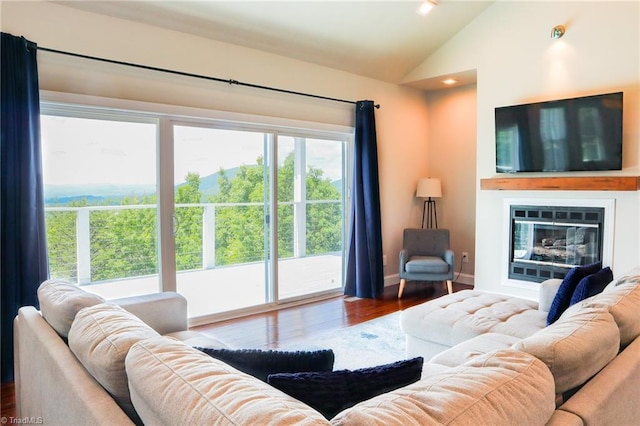 7768 Pinecone Ln, Hickory, NC 28602 - living area with vaulted ceiling, wood finished floors, and baseboards