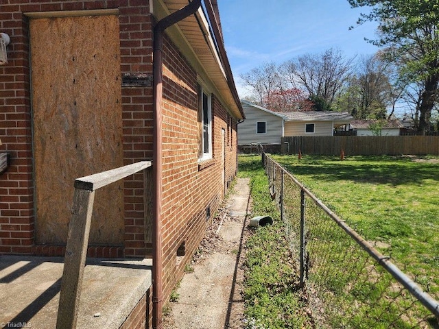 218 Huffman St, Greensboro, NC 27401 - view of property exterior with brick siding and crawl space