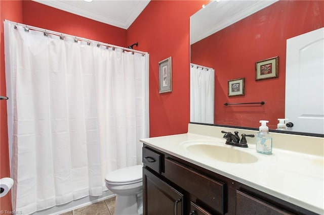 bathroom with toilet, ornamental molding, tile patterned floors, and vanity