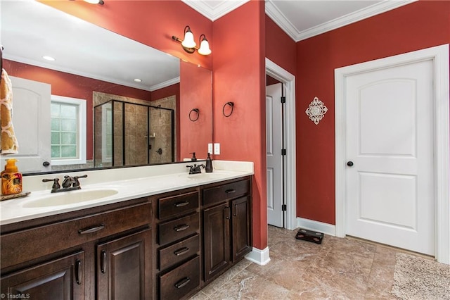 bathroom featuring a shower with door, ornamental molding, and vanity