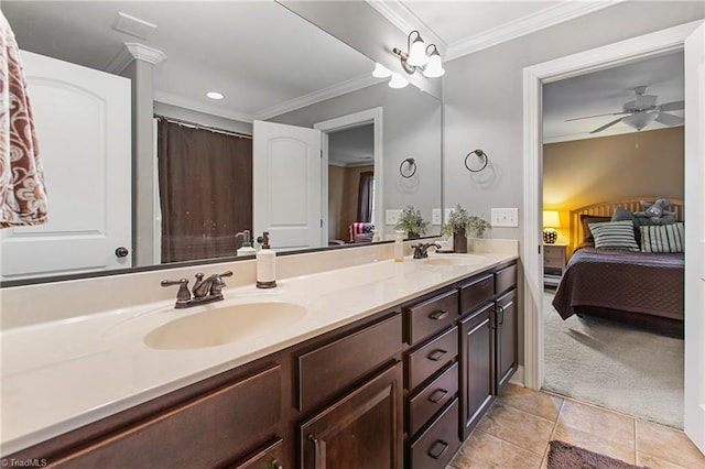 bathroom featuring ceiling fan, ornamental molding, tile patterned flooring, and vanity