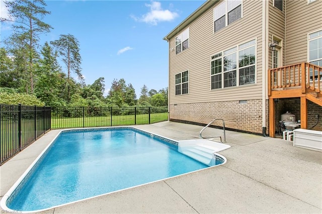 view of pool featuring a patio area