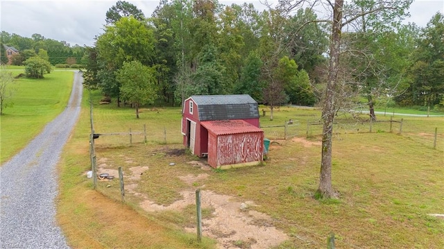 birds eye view of property featuring a rural view