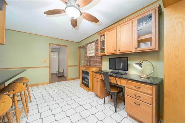 795 Morris Rd, Winston-Salem, NC 27101 - home office with built in study area, a ceiling fan, and baseboards