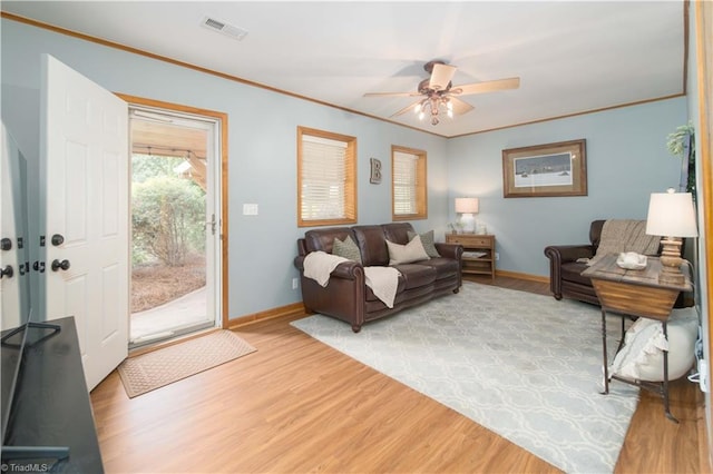 795 Morris Rd, Winston-Salem, NC 27101 - living room with light wood-style floors, baseboards, a ceiling fan, and ornamental molding