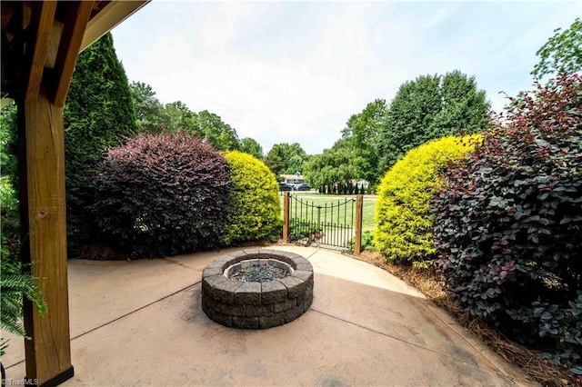 795 Morris Rd, Winston-Salem, NC 27101 - view of patio with an outdoor fire pit and a gate
