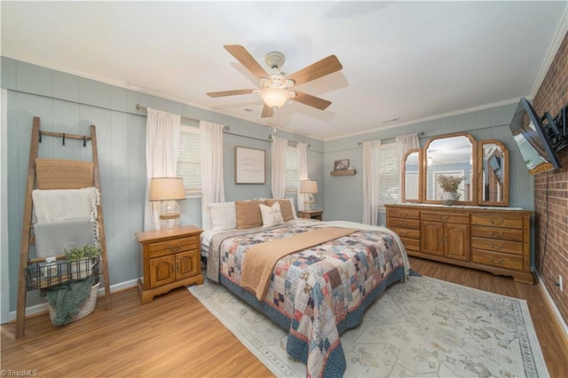 795 Morris Rd, Winston-Salem, NC 27101 - bedroom featuring ornamental molding, light wood-style floors, multiple windows, and ceiling fan