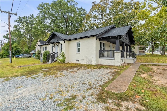 view of property exterior featuring a yard