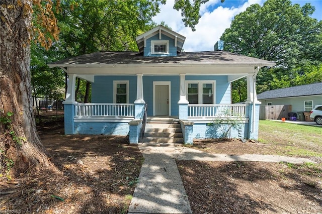 bungalow-style home featuring covered porch