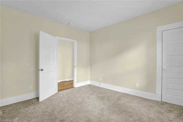 unfurnished bedroom with carpet floors