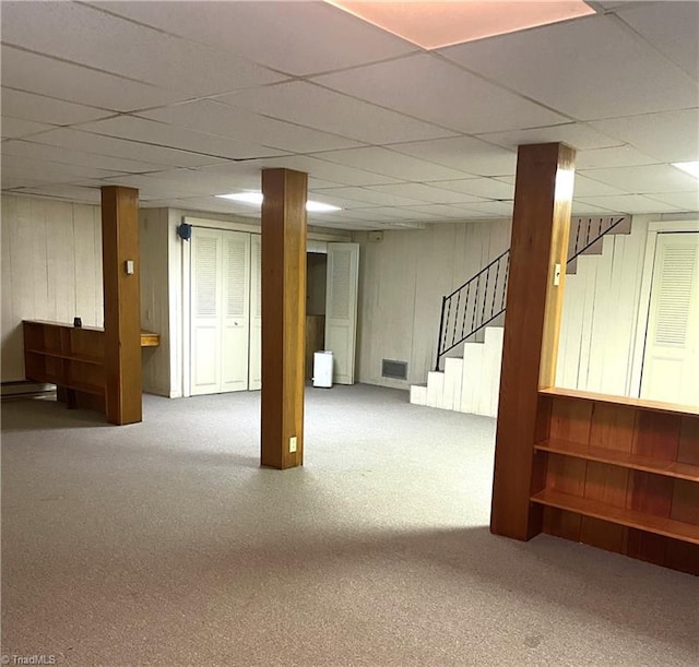 1229 Woodbrook Dr, Kernersville, NC 27284 - finished below grade area with stairs, carpet, and a paneled ceiling