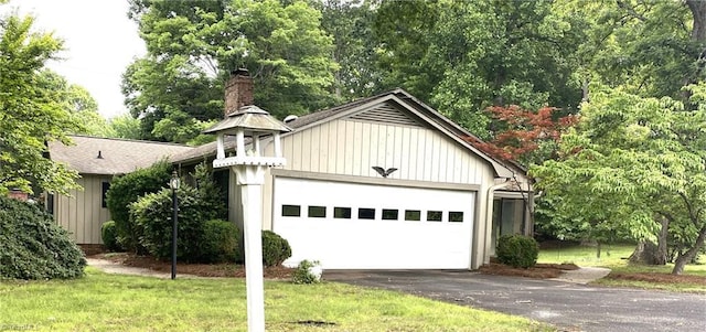 1229 Woodbrook Dr, Kernersville, NC 27284 - view of side of home featuring a chimney and a shingled roof