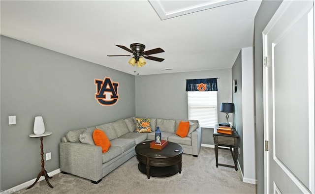 living room featuring light carpet and ceiling fan