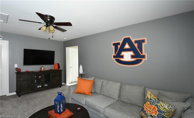 living room featuring carpet floors and ceiling fan