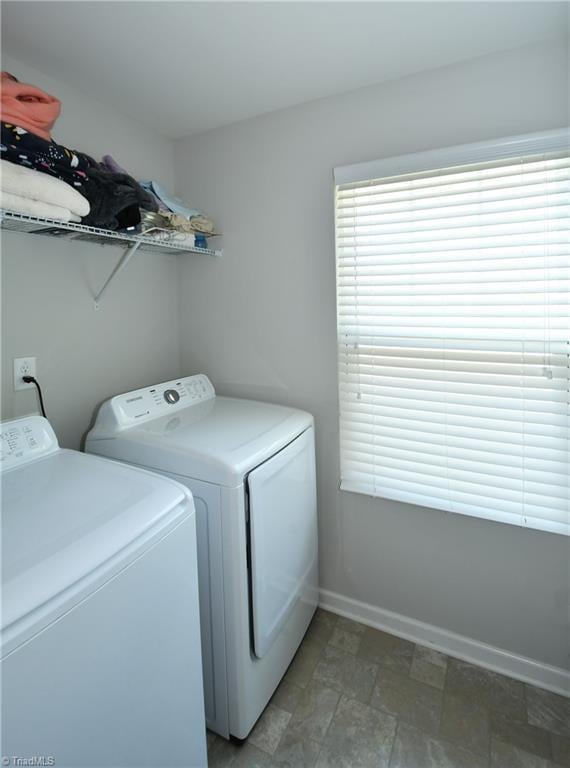 laundry area with washer and clothes dryer