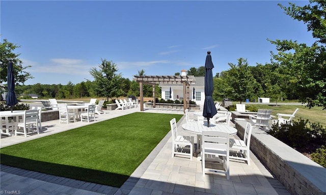 exterior space featuring a patio area and a pergola