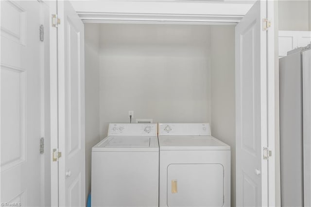 laundry area with washer and dryer and laundry area