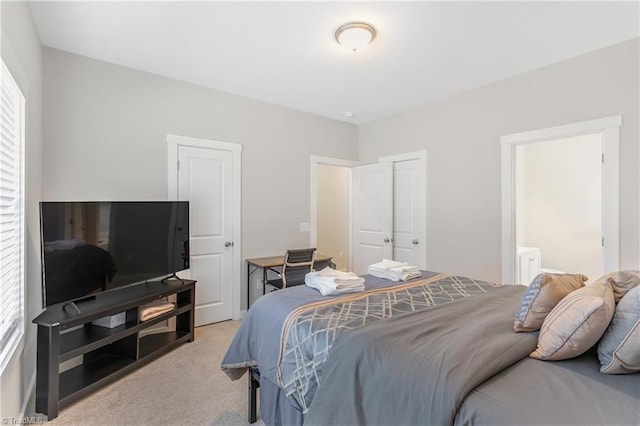 bedroom with light carpet