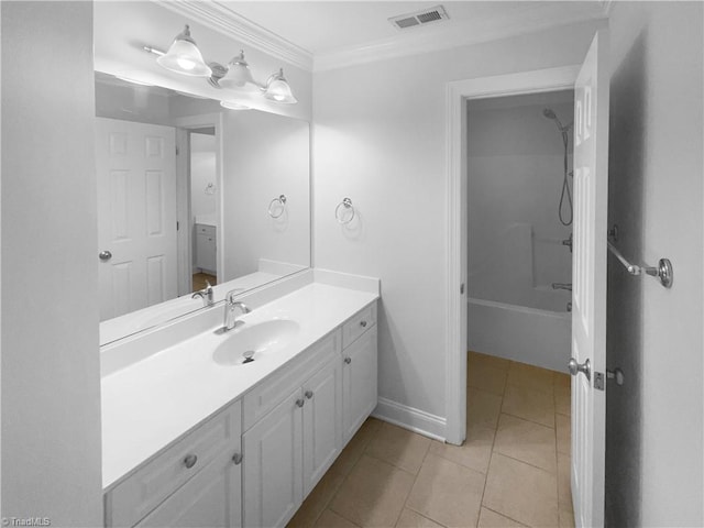 bathroom featuring vanity, shower / washtub combination, crown molding, tile patterned flooring, and baseboards