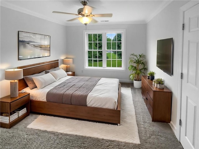bedroom featuring ornamental molding, baseboards, carpet, and ceiling fan