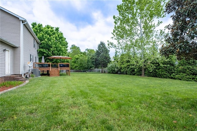 view of yard with a deck