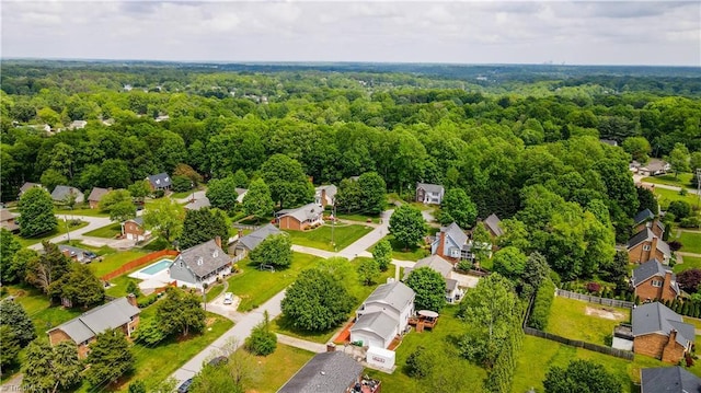 aerial view with a forest view and a residential view