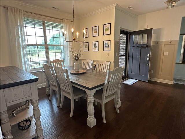 107 Saddlebrook Dr, Advance, NC 27006 - dining room with a chandelier, dark wood-type flooring, and crown molding