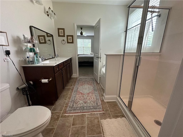 107 Saddlebrook Dr, Advance, NC 27006 - full bathroom featuring ensuite bath, double vanity, a shower stall, and a ceiling fan