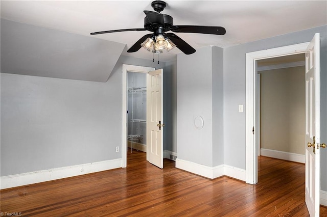 unfurnished bedroom featuring a closet, ceiling fan, and dark hardwood / wood-style floors