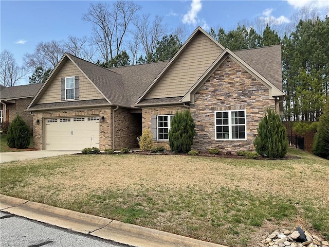 craftsman inspired home featuring stone siding, roof with shingles, concrete driveway, and a front yard