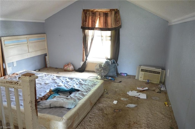 2706 W English Rd, High Point, NC 27262 - carpeted bedroom with vaulted ceiling, ornamental molding, a textured wall, a wall mounted AC, and a textured ceiling