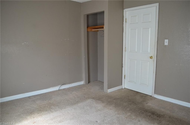2706 W English Rd, High Point, NC 27262 - unfurnished bedroom with carpet flooring, a closet, and baseboards